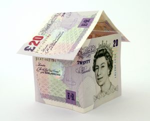 Image of bank notes in the shape of a house